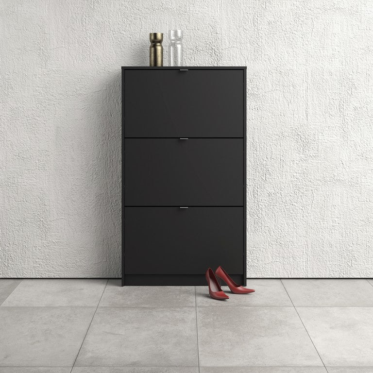 Shoe cabinet w. 3 tilting doors and 1 layer.